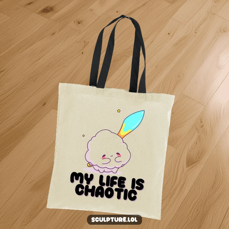 Funny tote bag displaying a fluffy cloud character reaching to hug a flying meteor, perfect for carrying essentials.